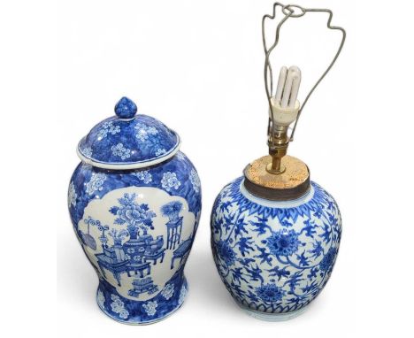 A Chinese blue and white vase painted with trailing flowers, 25cms high now converted to a table lamp together with a Chinese