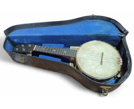 A banjolele with decorative white metal back plate, in case, 56cms long overall