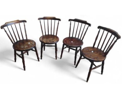 A set of four Hala Brand stick back Windsor chairs with circular seats (4)