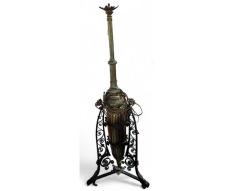 A large, decorative brass and wrought iron standard lamp, 160cms high