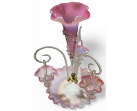 A Victorian pink and shaded white glass epergne having three branches suspending three baskets, 43cms high