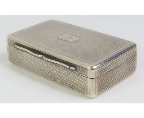 A Victorian rectangular silver snuff box with guilloche decoration, gilt lined and with presentation inscription inside the c