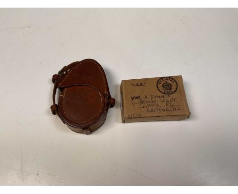 A leather cased WWI pocket compass with military markings and a group of WWII medals in box inscribed 'Capt. A. Downie 41528'