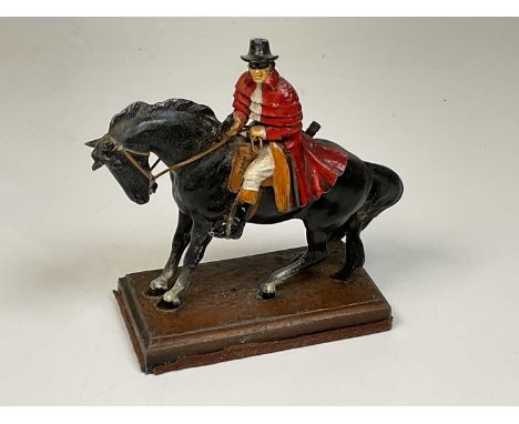 A cold cast table lighter in the form of Dick Turpin on horseback.