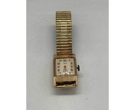 LIMIT; a gentleman's vintage Art Deco 9ct yellow cased wristwatch with Arabic numerals to the rectangular dial with subsidiar