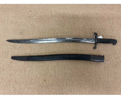 A Lee Metford bayonet and Scabbard, length of blade 57.5cm.Condition Report: The blade is very mottled and there are some scr