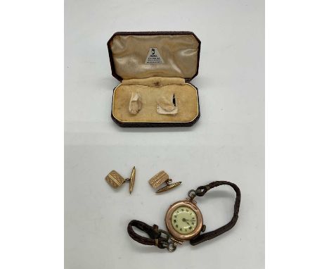 A pair of 9ct yellow gold cufflinks, approx. 2.4g and a vintage wristwatch with 9ct yellow gold case.