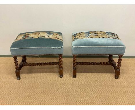 A pair of Louis XIII walnut stools, mid 17th century each of rectangular form upholstered in blue velvet and foliate tapestry