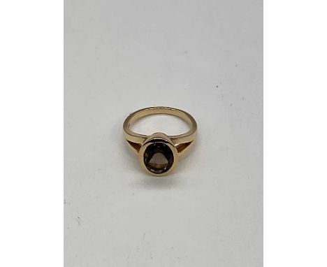 A 9ct yellow gold smoky quartz dress ring, size M, approx. 5.4g. 