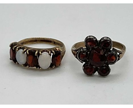 Two 9ct yellow gold dress rings, one set with garnet and opals, combined approx. 6.2g (2). Garnet and opal ring K 1/2, cluste