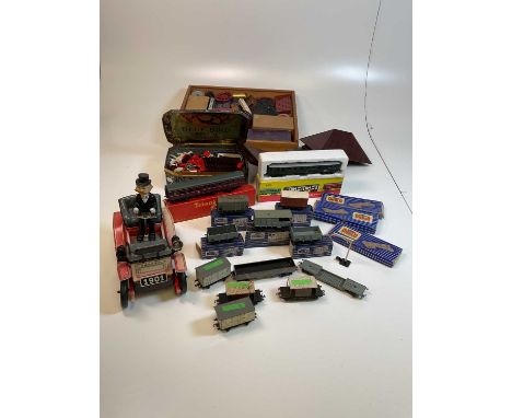 A quantity of vintage toys comprising Meccano, Hornby Dublo, Bayko and a tin plate battery operated car.