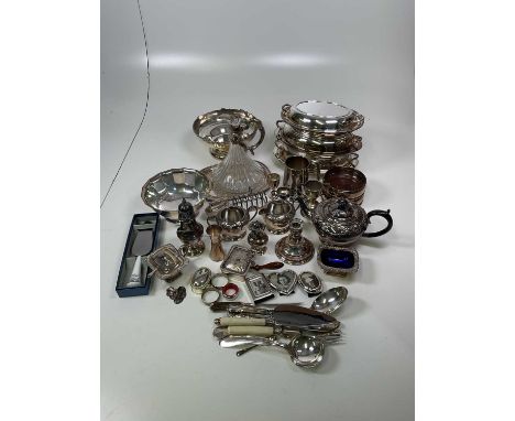 A quantity of silver plate including teapot, candlestick, cigarette holder etc.