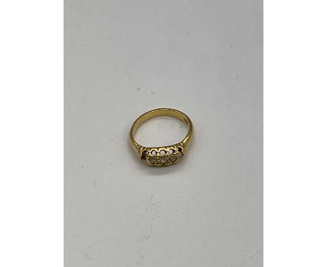 An 18ct yellow gold and diamond ring set with four old cut stones (one missing), size K, approx. 3.9g.