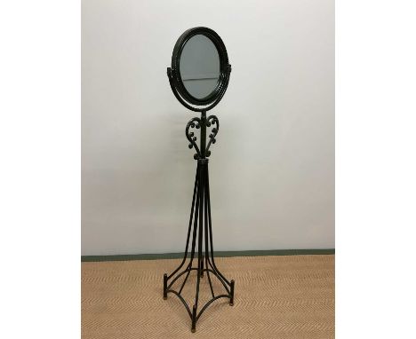 A decorative mirror on a metal stand, height 140cm.
