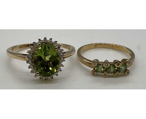 Two 9ct yellow gold dress rings including one set with oval peridot, combined approx. 4.9g (2). Three stone ring size M1/2, o