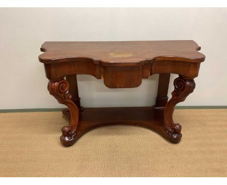 A mahogany shaped serpentine hall console table with carved cabriole legs, height 72cm, width 120cm, depth 55cm.