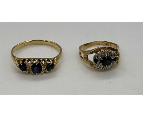Two yellow metal sapphire and diamond rings sizes R and J, obscured marks possibly 18ct, combined approx. 7.1g (2).