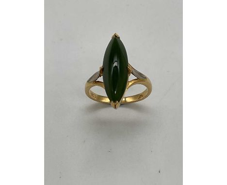 An 18ct yellow gold jade boat shaped ring, size N, approx. 5.9g.