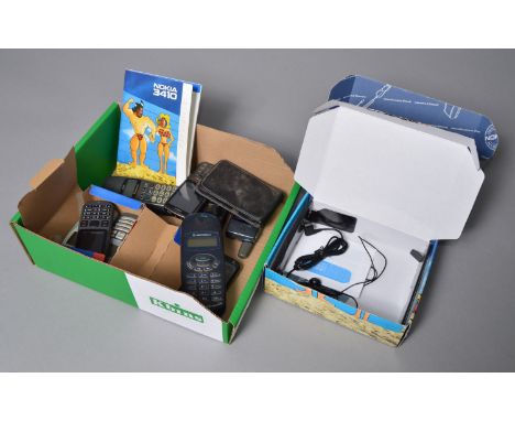 9 vintage mobile phones including Motorola, Nokia, HTC etc, some with boxes and accessories