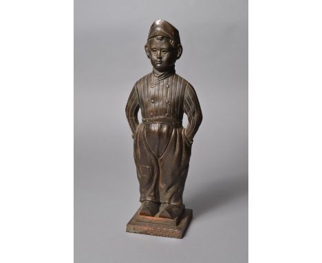 Early 20th Century after Harry Banks (1869-1947) - A Bronzed cast iron fire companion rest in the form of a dutch boy on a st