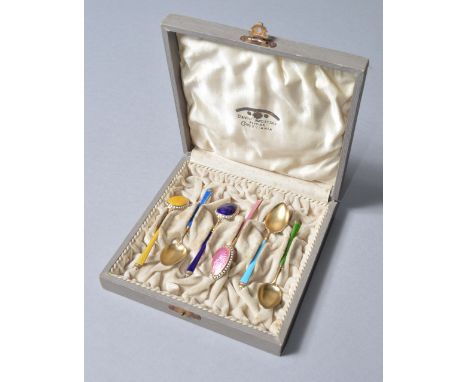 A cased set of 6 David Anderson Norway silver gilt and enamel coffee spoons. Spoons marked 925.