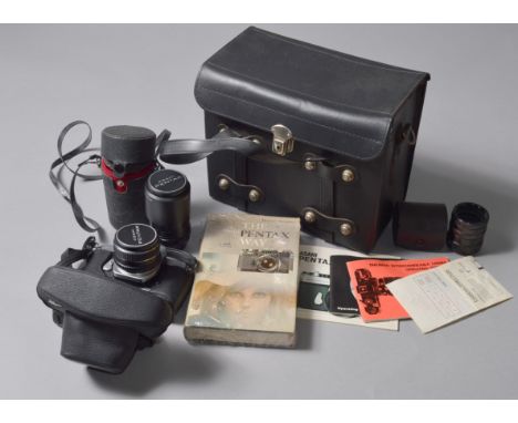 An assortment of Pentax and other camera lenses and accessories et 