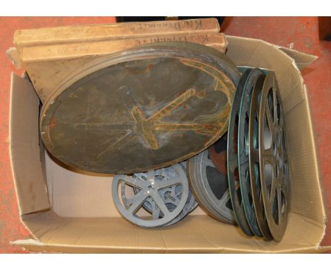 A mixed lot of projector equipment and cine equipment and films etc together with a PYE wooden cased radio