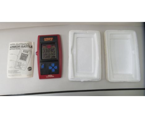 A 1978 Mattel Armor Battle, handheld electric game with instructions&nbsp; 