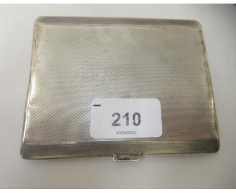 A silver folding cigarette case with engine turned decoration&nbsp; Birmingham 1941&nbsp; 