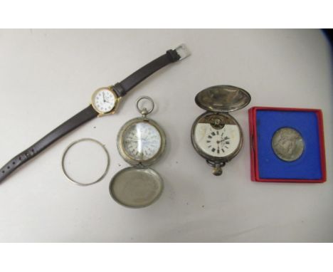 A mixed lot: to include a silver cased pocket watch, faced by an enamelled Roman dial 