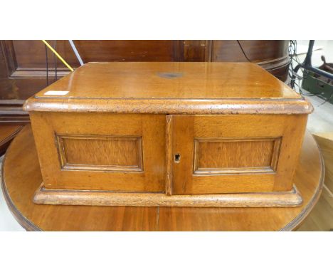 A part canteen of silver plated and other flatware, in a two drawer oak case 