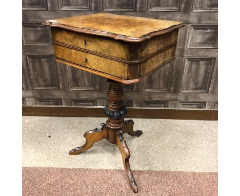 VICTORIAN BURR WALNUT SEWING TABLE, the hinged cover opening to reveal lidded and open compartments, on turned column with tr