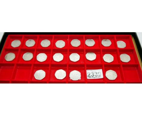 Twenty assorted collectors edition 50p coins, including Beatrix Potter, Paddington, NHS, Peoples Act, Sherlock Holmes etc. UK