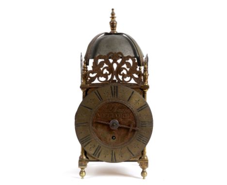 A brass lantern clock, the 16.5 cm diameter dial signed Thos Moore, Melford, with Roman numerals, fitted a single fusée movem