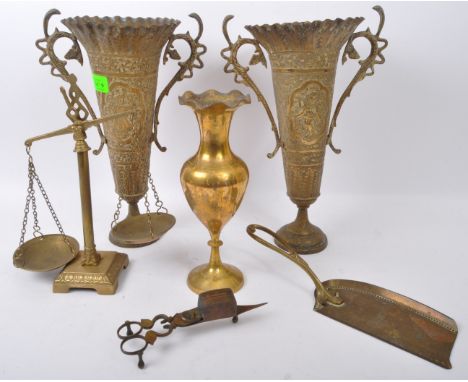 An assortment of vintage 20th century brass decorative items. The lot to include a pair of Oriental double handled vases, a c