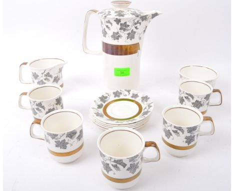 Fieldlings - Staffordshire England - A vintage 20th Century Crown Devon coffee tea service set. Comprising of cups, saucers a