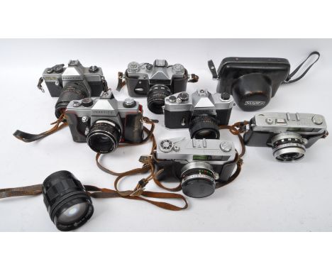 A collection of 20th century cameras and lenses to include a Yashica with Yashinon-DX lens, a&nbsp;Yashica TL-Electro with Ya