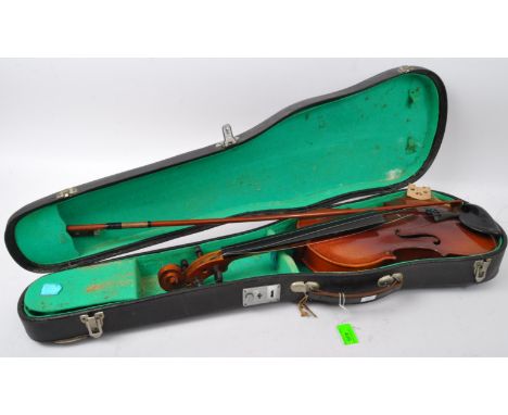 A vintage 20th century Lark violin with accompanying bow, held within hard case. Measures approx 57cm length.&nbsp;