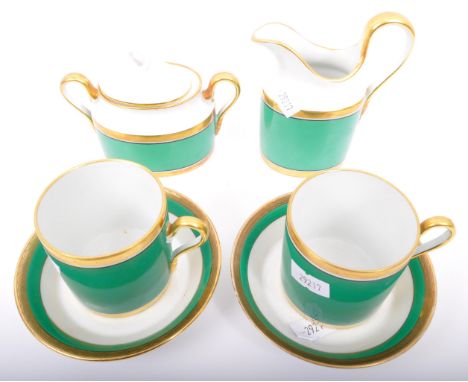 Richard Ginori - Manifattura Di Doccia - Florence, Italy. A mid 20th Century olive green and gilt two person tea service set.