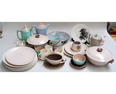 A mixed lot of ceramics containing a Poole pottery blue and cream topped coffee jug together with a number of Poole pottery d