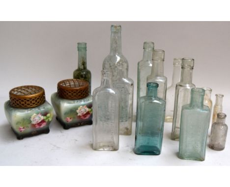 A selection of small vintage glass bottles (7), one with table spoon increments, two marked 'California Fig Syrup Co, Califig