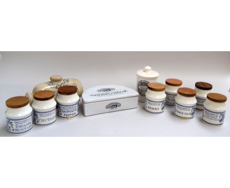 A collection of jars, including a set of eight Fortnum and Mason ceramic preserve jars with various labels, a Wayman's sugar 