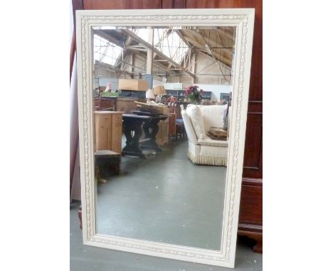 A large rectanguilar cream painted mirror with twist carved banding and floral flourishes 100 x 152cm