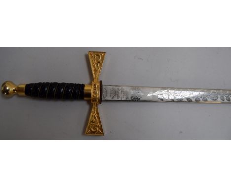 A Wilkinson Sword Ltd parade/display sword, the blade etched with roses and gilt crossbar, 76cm blade length