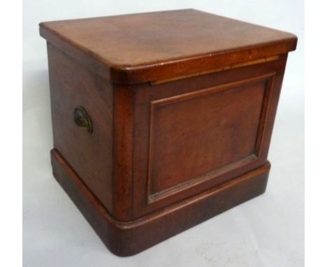 A late Victorian mahogany campaign commode with folding arms and ceramic liner