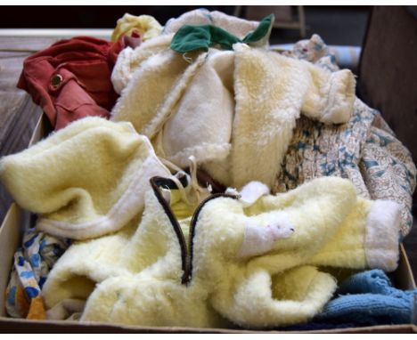 A quantity of Vintage dolls clothes in a vintage Asprey of Bond Street box