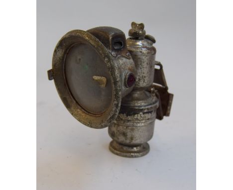 An antique chrome P&H panther gas lamp for a bicycle or motorcycle