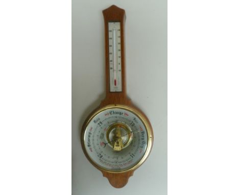 A banjo barometer with thermometer in wooden surround 49cmL