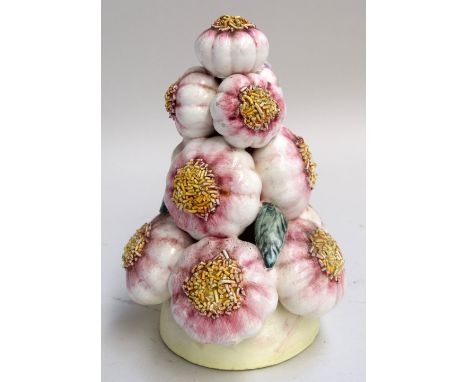 A ceramic statue of garlic bulbs