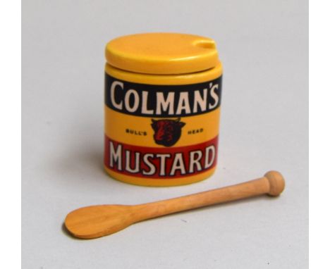 A ceramic Colman's Mustard pot with small wooden spoon